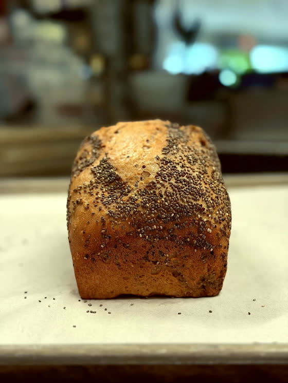A cut raisin loaf on a plate